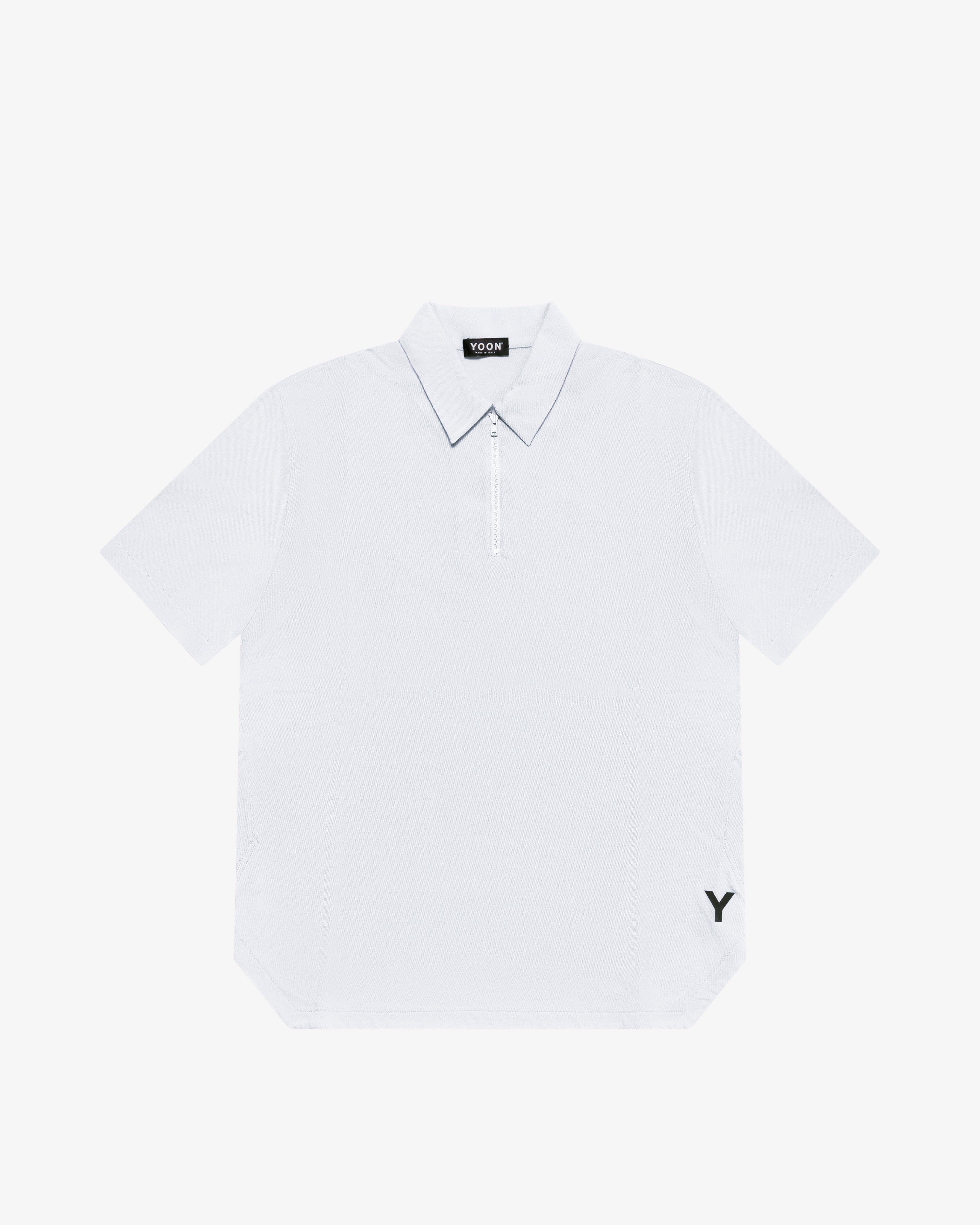 Polo in cotone con zip bianco