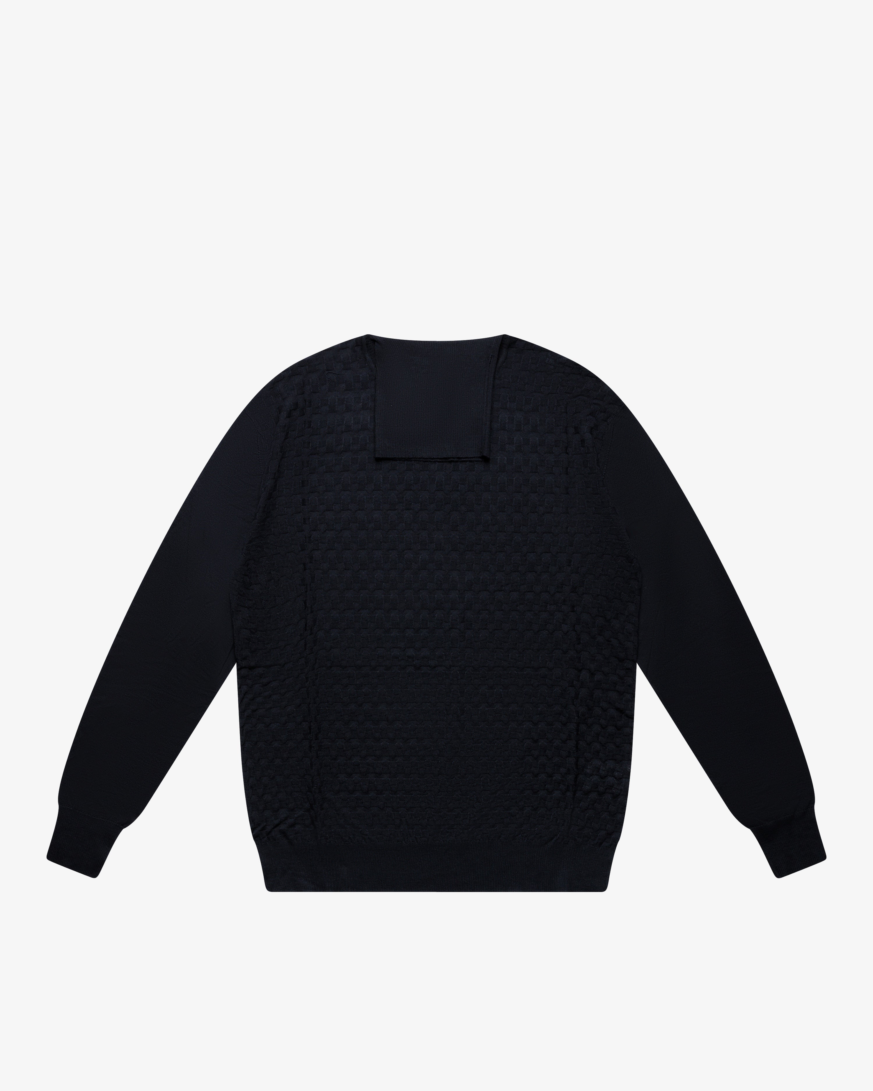 Maglia dolcevita a scacchetti blu