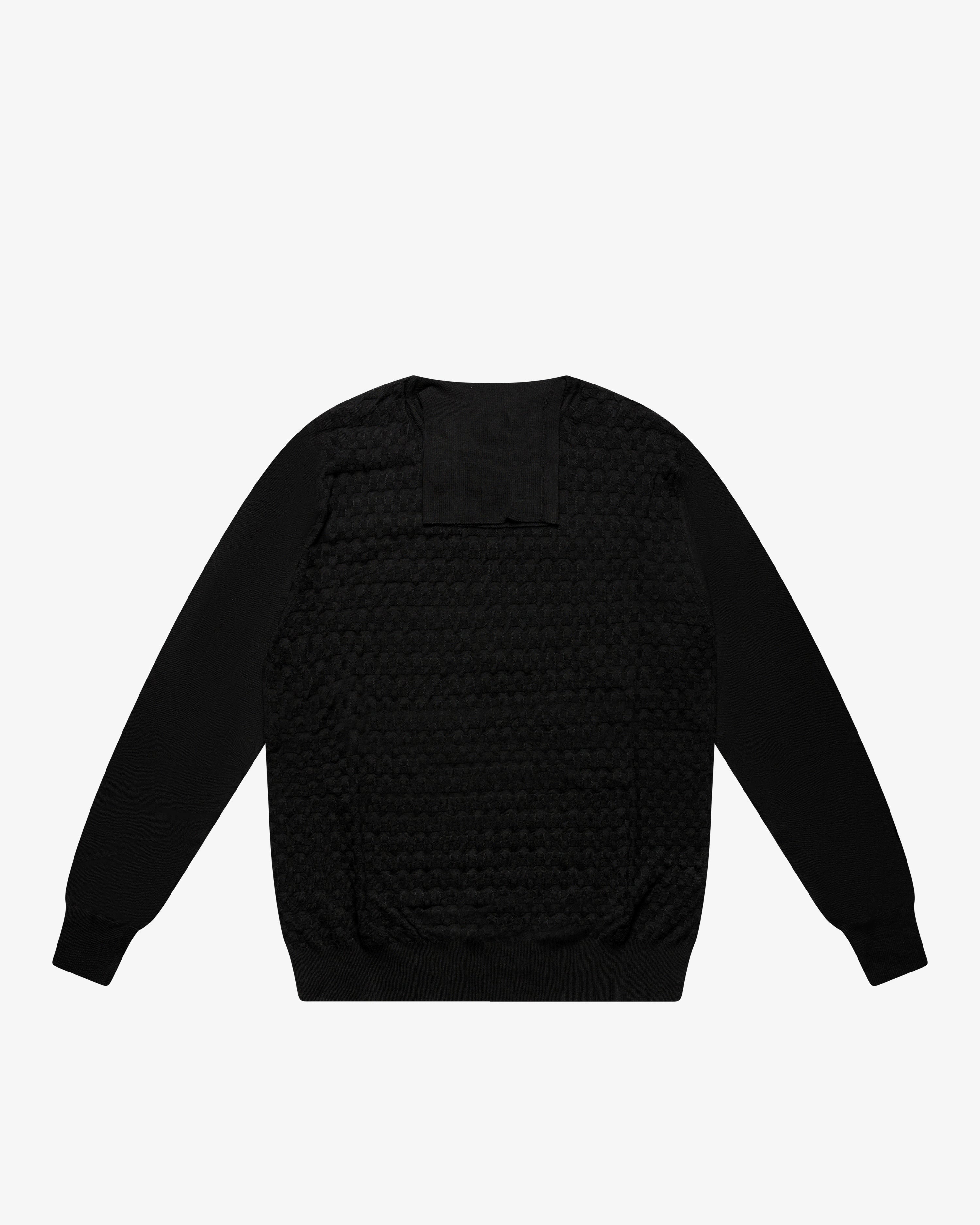 Maglia dolcevita a scacchetti nero
