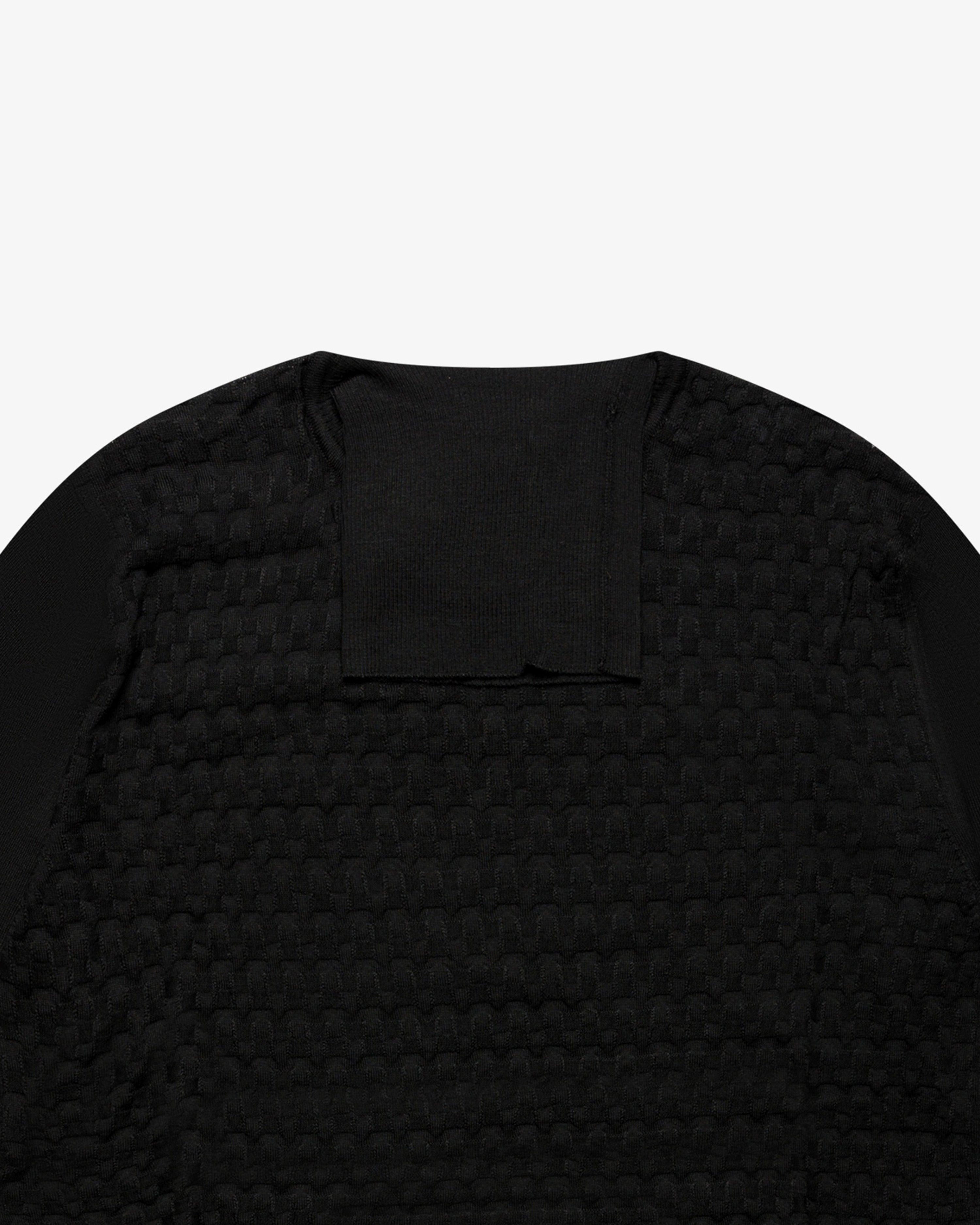 Maglia dolcevita a scacchetti nero