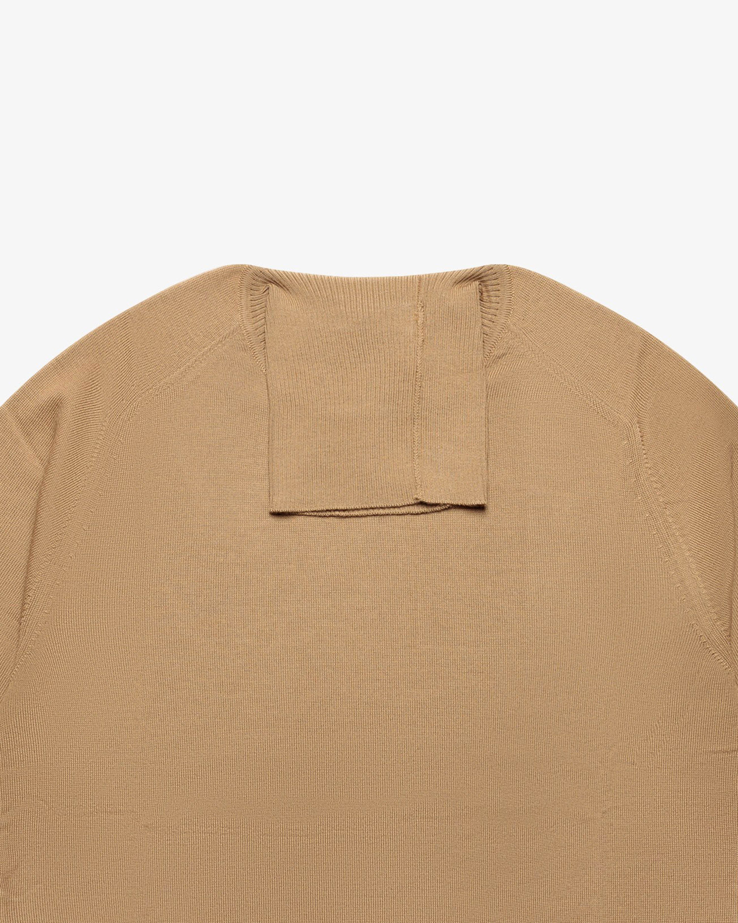 Maglia dolcevita in lana cammello
