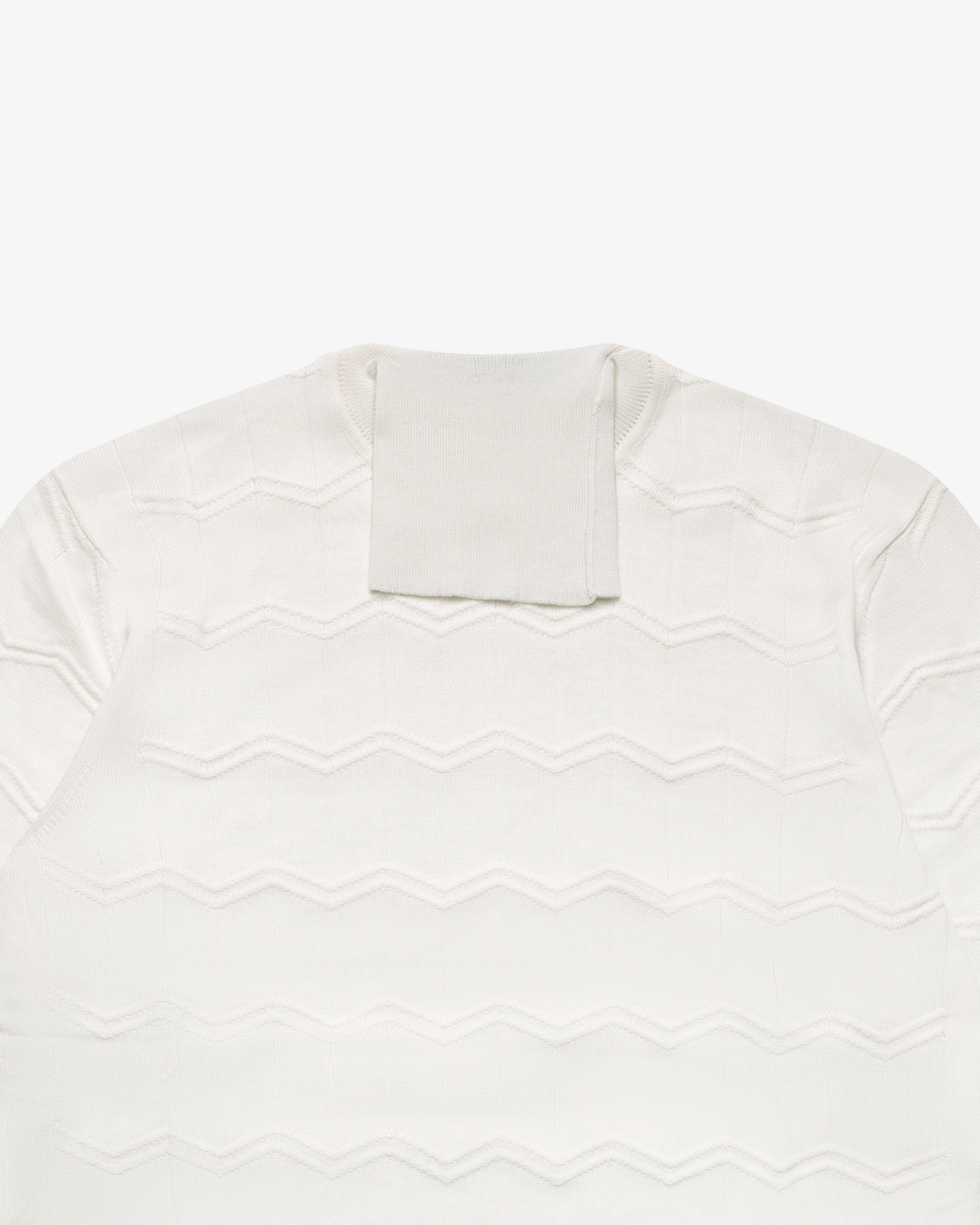 White turtleneck sweater