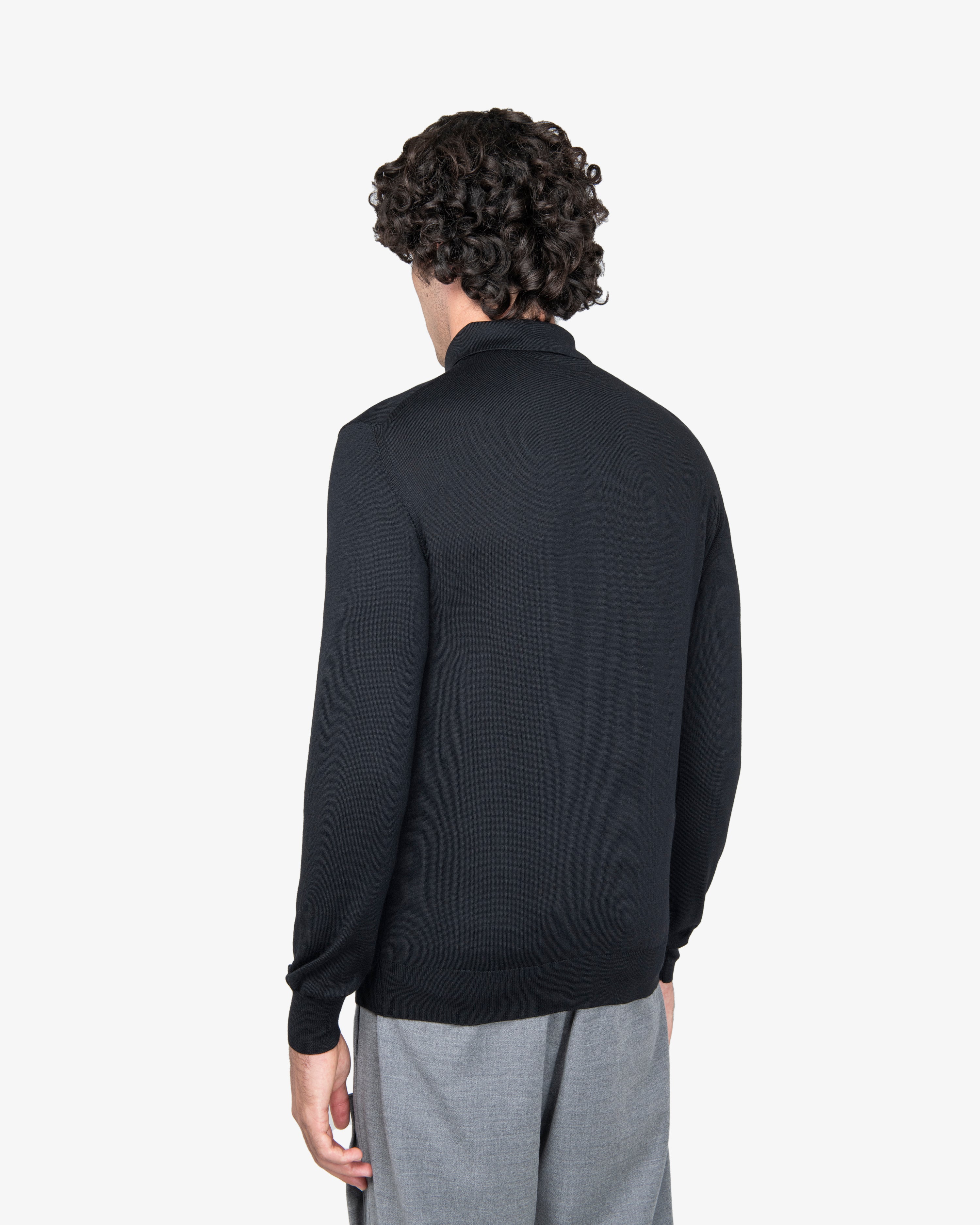 Polo zip manica lunga in lana nero